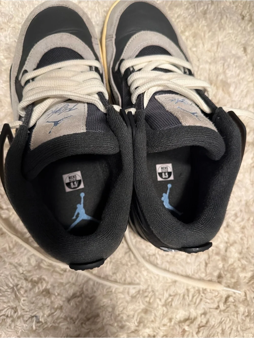 Jordan men’s Low-Top Sneakers in Black, Gray and Cream with Light Blue Jumpman